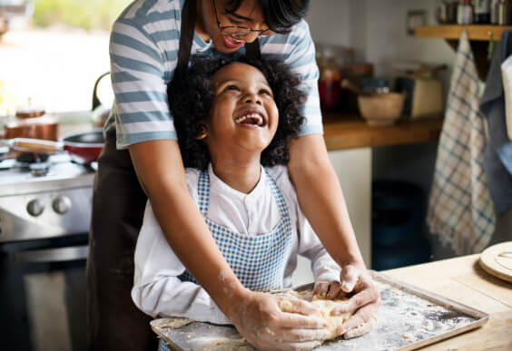 Father and daughter bake after seeing a family therapist.