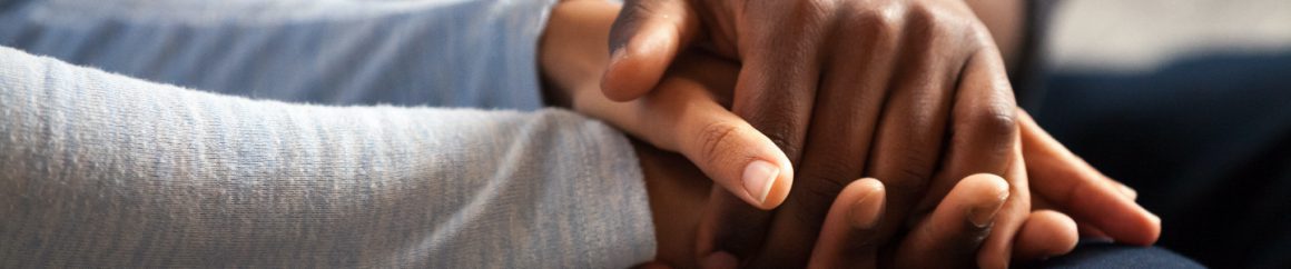 Holding hands symbolize mental health support.